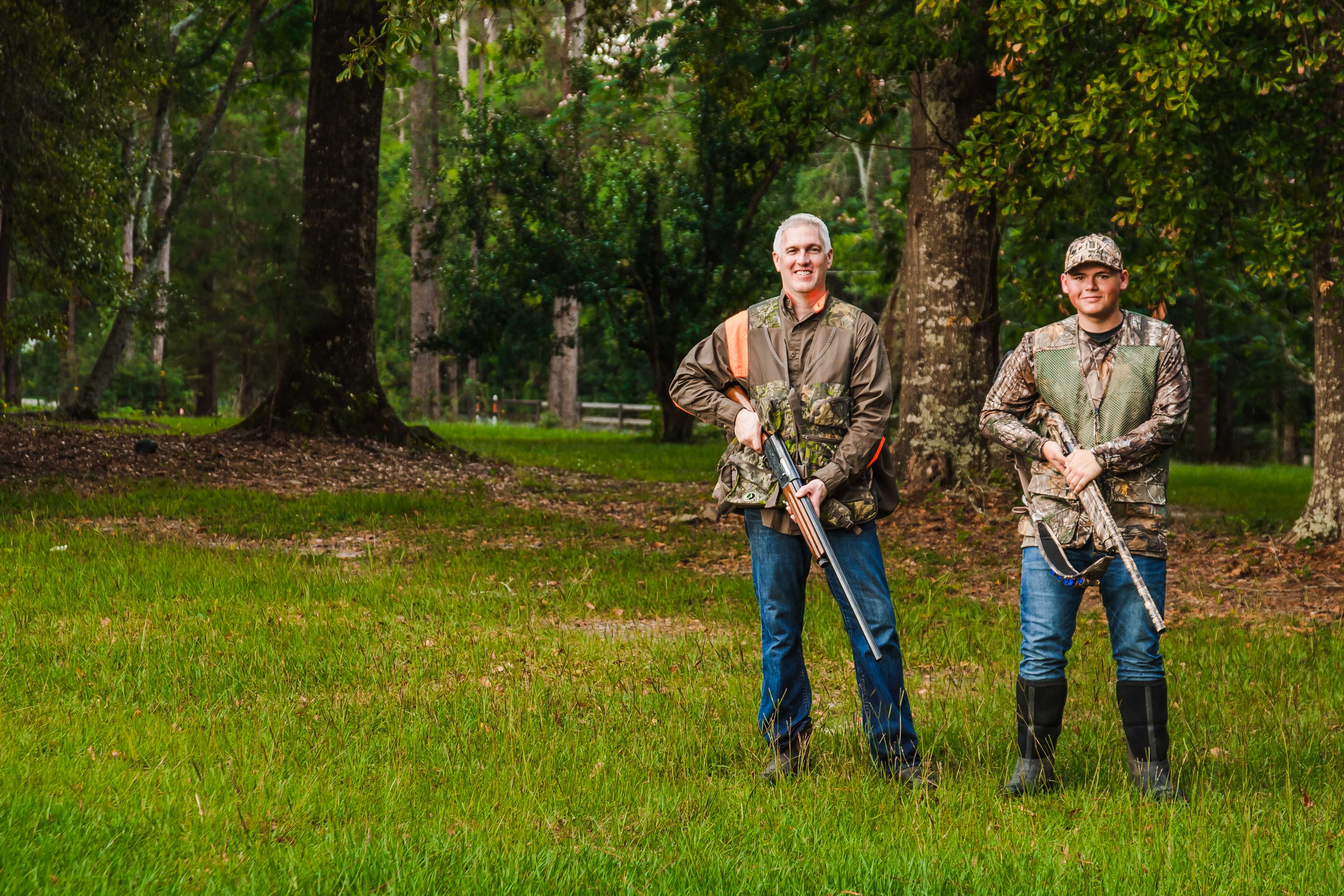 Shane Abbott and his son hunting in Northwest Florida woodlands